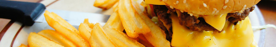 Eating American (Traditional) Burger Diner at Forty Niner Restaurant restaurant in Aiea, HI.
